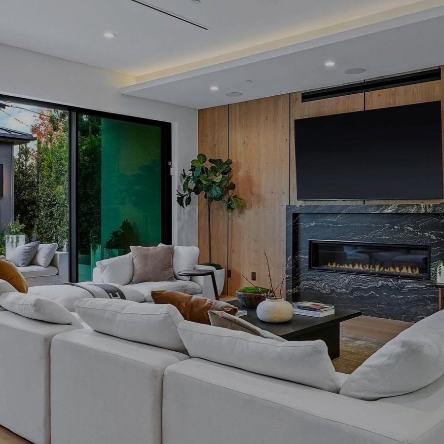 Living room, stone hearth and disappearing glass