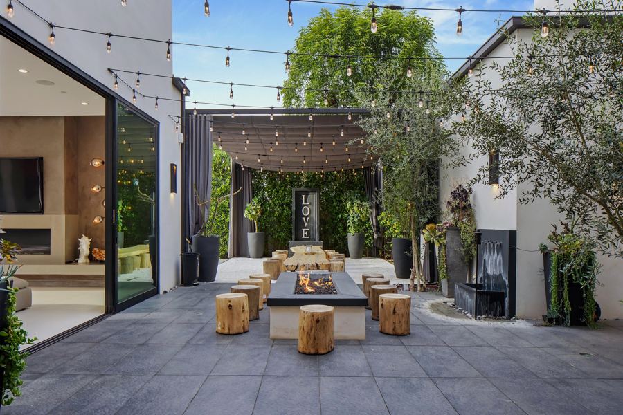 Courtyard lounge under string lights