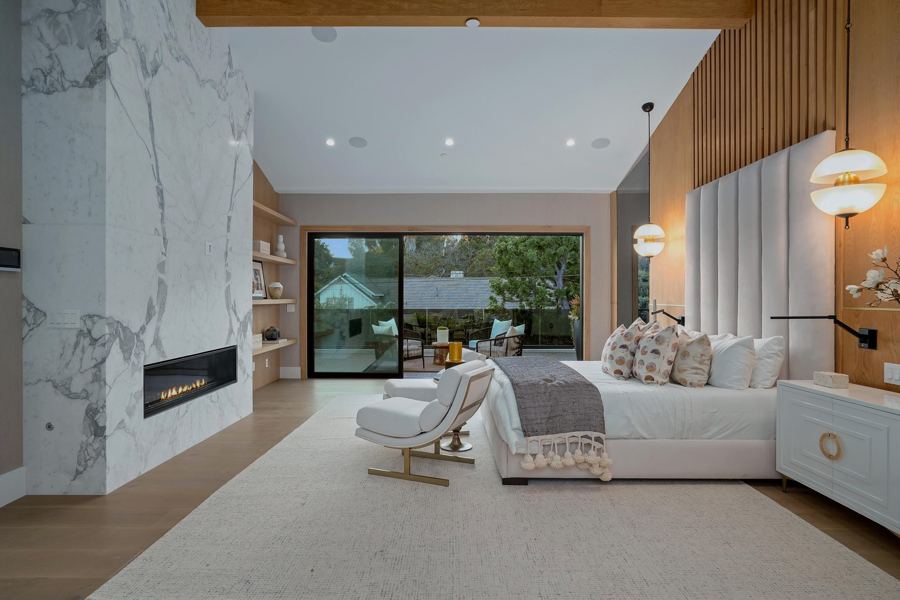 Book-matched stone fireplace, primary suite