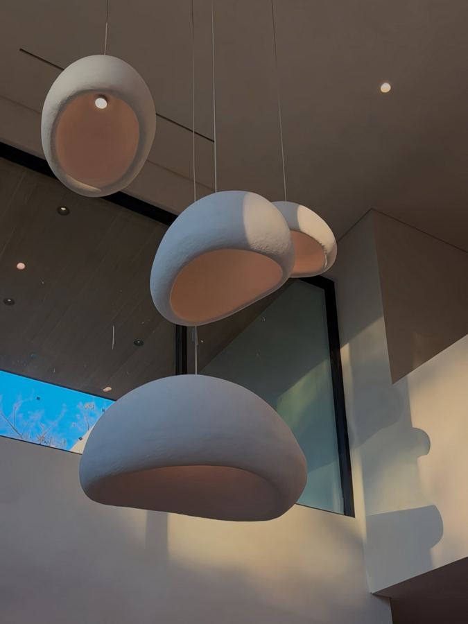 Sculptural pendants at the pool loggia